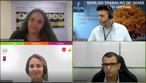 Foto de quatro pessoas em reunião telepresencial. Foto mostra print da tela do computador com dois homens e duas mulheres em uma vídeo chamada. 