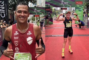 Um homem e uma mulher após corrida posando para foto